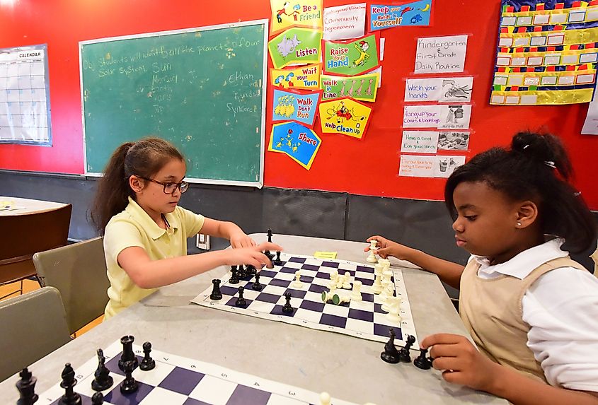 Brooklyn Police Athletic League and King's County DA's office sponsored an afterschool chess program for Bed-Stuy elementary students. Image Credit a katz via Shutterstock.