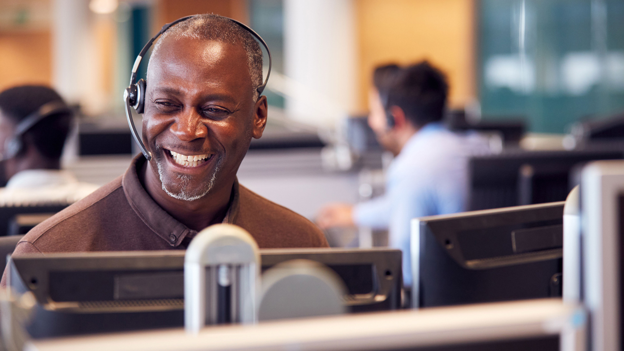 Customer service representative wearing a headset