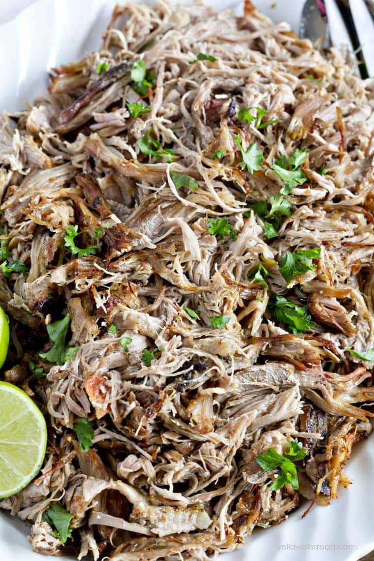 Easy Slow Cooker Carnitas - Tender pork cooks to melt in your mouth perfection in your crockpot!