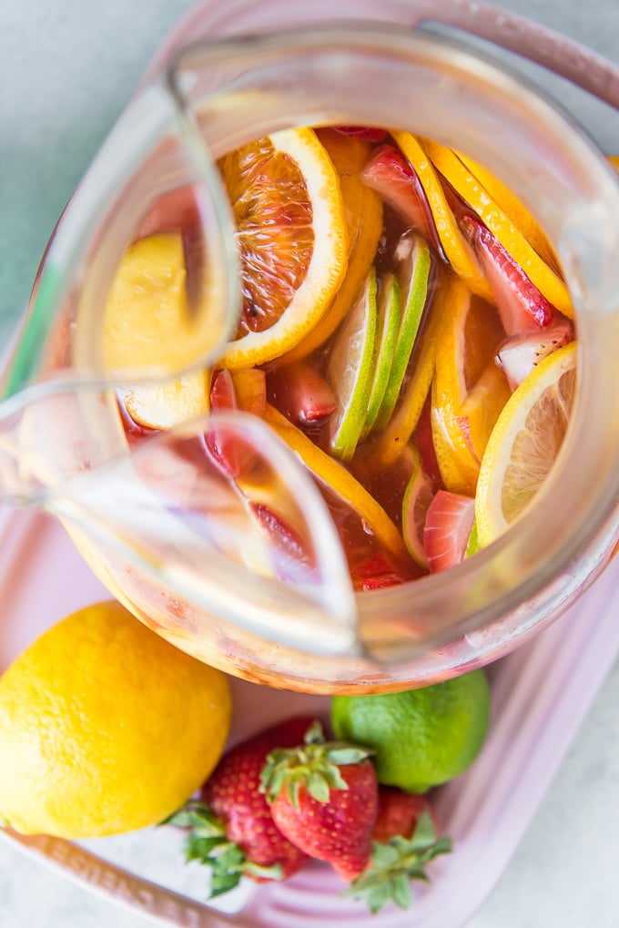 An overhead shot of a pitcher of White Sangria