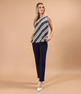 Ankle pants with loose striped viscose blouse