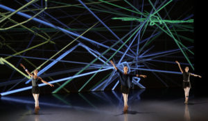 Three people standing in a sensorium.