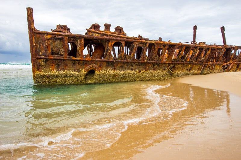 rusted Maheno Shipwreck on the sand