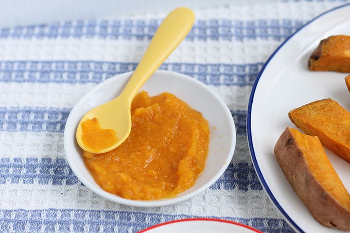 sweet potato puree for baby on white plate