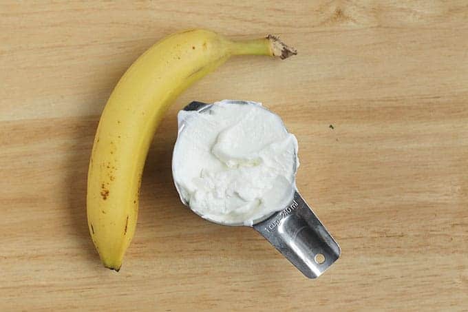 banana-and-yogurt-on-cutting-board