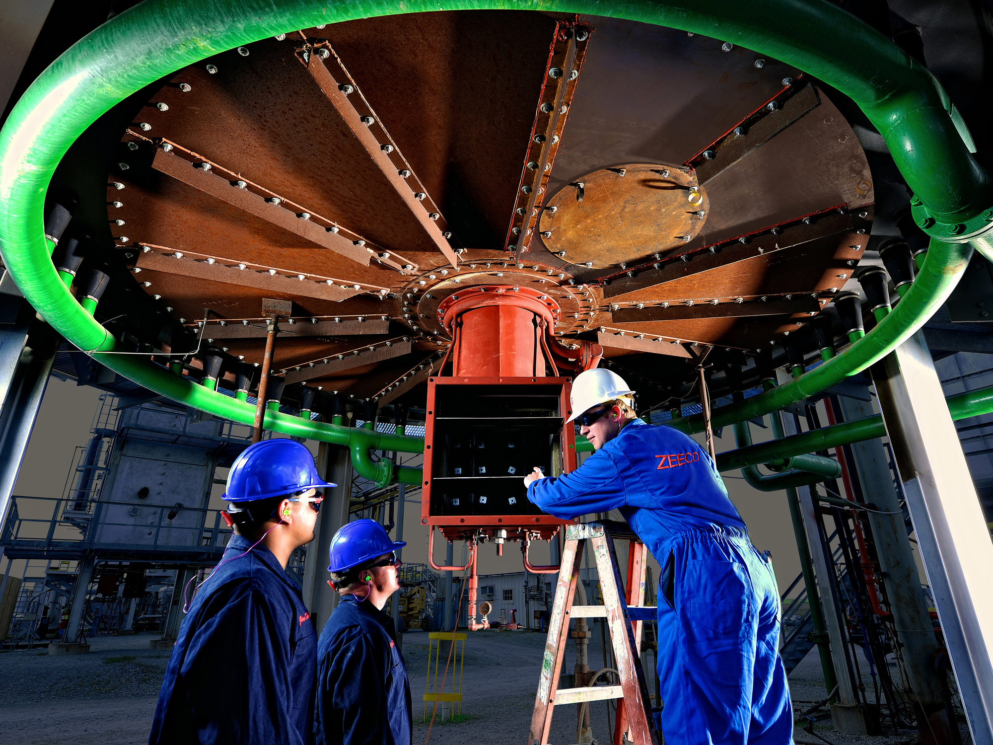 Workers inspecting equipment