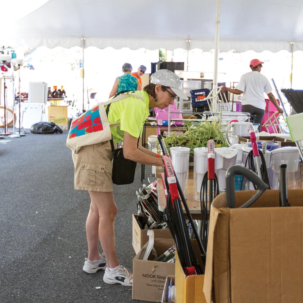 A woman browsing at the Move Out Collection Drive