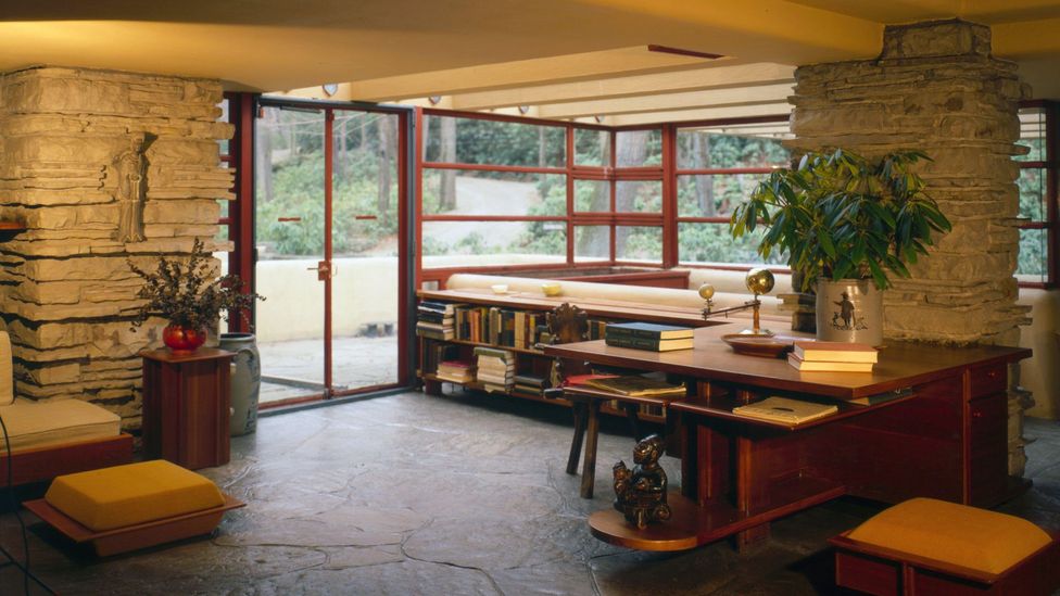 Much of the furniture in Fallingwater, such as this living room, was built into the structure so its interior design would remain fixed (Credit: Alamy)