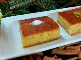 A piece of coconut cake on a plate